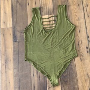 Olive colored body suit